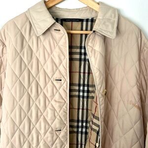 Burberry brand jacket (Used) it has one small stain but it’s in good condition
